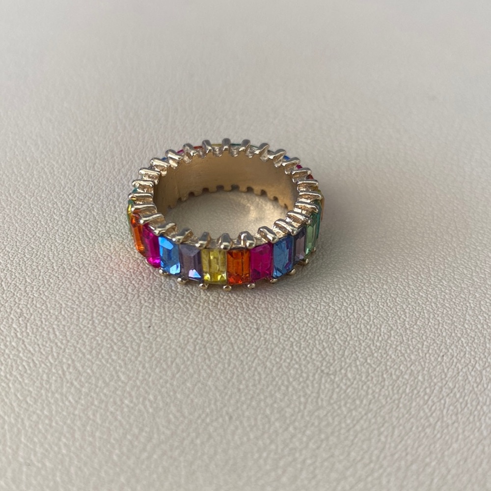 Gold band with rainbow stones